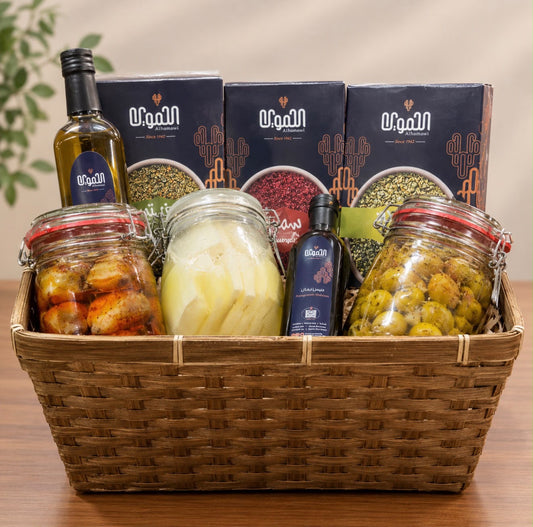 A distinctive and elegant gift basket(Zaatar Sumac Freekeh Makdous Grilled olives White Cheese Pomegranate molasses Olive oil.)